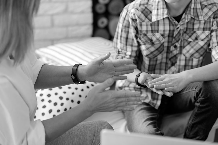 Use it. Female hands being parallel to each other in the air while showing something during discussion